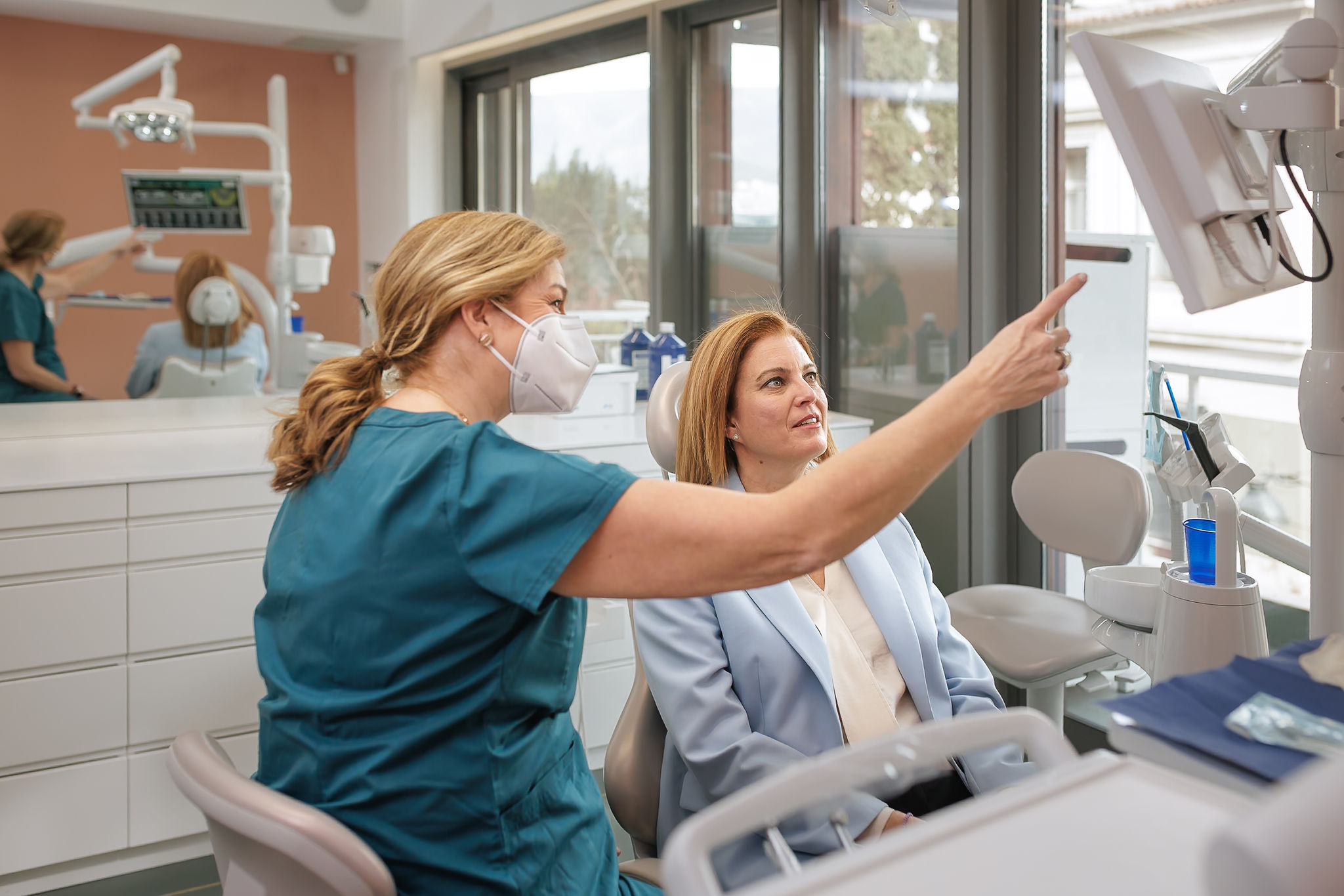 Dr Anna Lagou working with a patient
