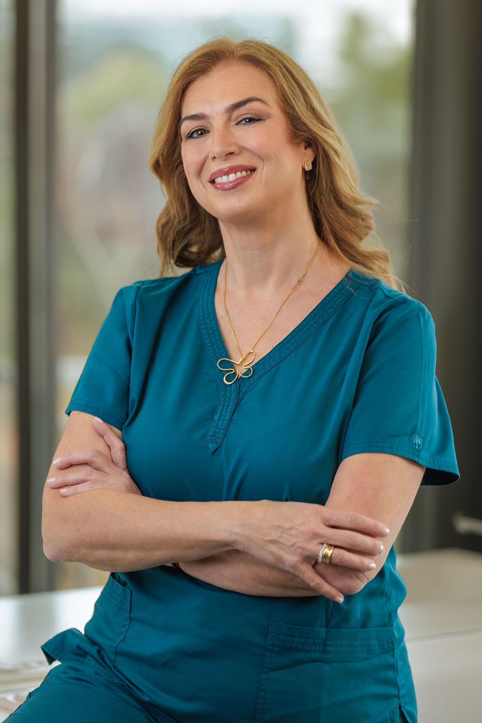 Portrait of Dr. Anna Lagou, experienced periodontist and implantologist in Athens